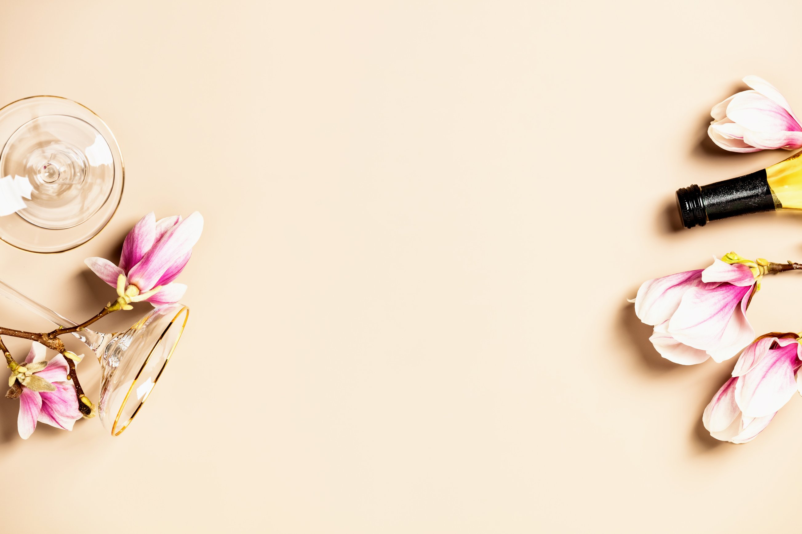 Spring Magnolia Flowers with Bottle of Wine and Wine Glass